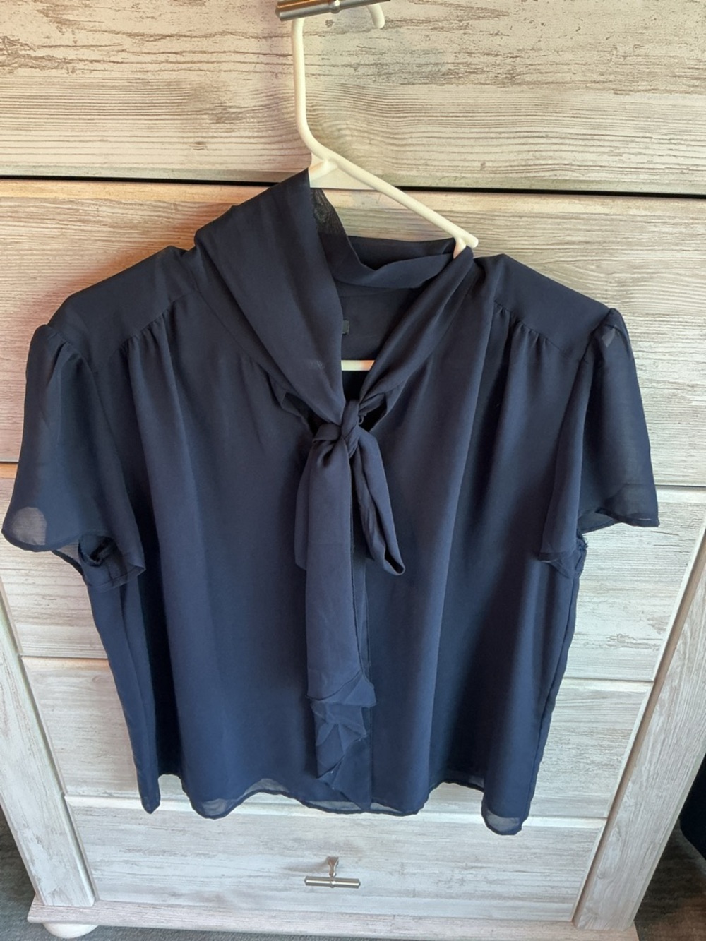 Ann Taylor flutter sleeve semi-sheer top with self tie bow